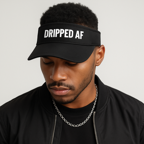 single man wear a fashion visor with a dripped af logo